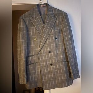 This is a 3 piece grey Tiglio suit